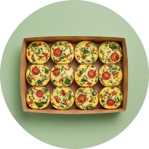 hero-baked-egg-bites-with-herbs-&-veg-(12-units)-in-box-no-steam-top-view 1-1